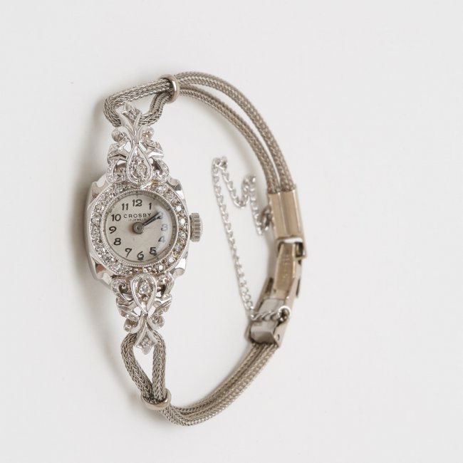 1940s 14kt Gold & Diamonds Crosby Ladies Cocktail Watch: During the late 19th and early 20th centuries, Crosby was a private label distributed by watch magnate Invicta group. The well-priced watches are known for their simple, utilitarian style. Movement: Q