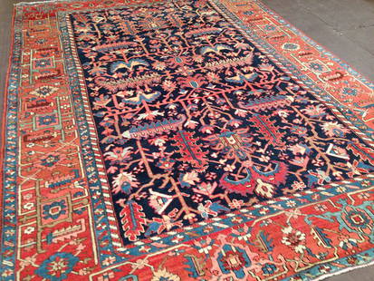 Antique Persian Heriz Carpet: Nice old Persian Heriz carpet in all over design and navy field. Size 11-5x8-5 Ft. Circa 1920 in excellent condition. Please note that this lot has a reserve.