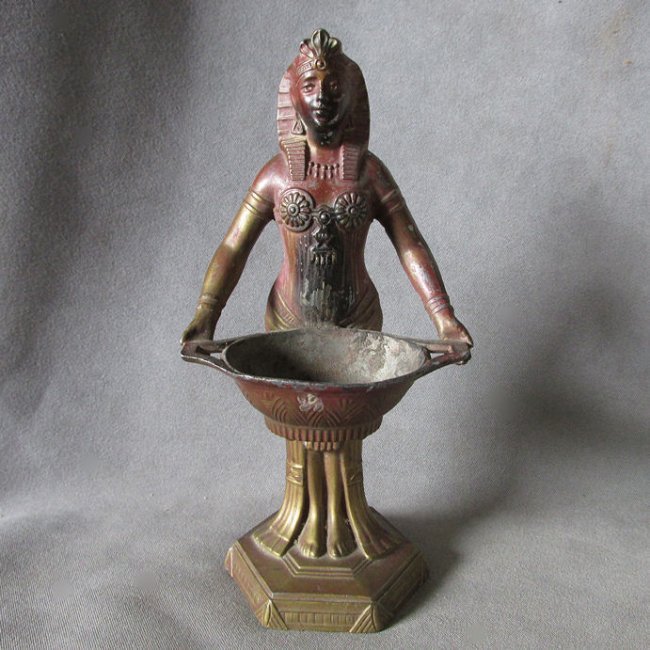 c1920s French Art Deco Egyptian Revival, Queen,: An antique figural Incense Burner by Vantines. The Incense Burner is in the figural form of an Egyptian Queen. She was made by Vantines and is marked under the tray, Vantines, Made in France. Shipping
