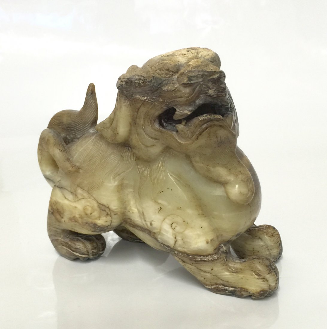 Old jade carving of a qilin. (1 of 7)