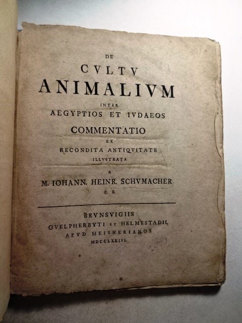 1773 De Cultu Animalium Egyptians and Jews: “De Cultu Animalium Inter Aegyptios Et Judaeos”, by M. Johann. Heinr. Schumacher, printed at Brunswig, 1773. 64 pages. In marbled boards with binders tape along spine. Very Good, mild discoloratio