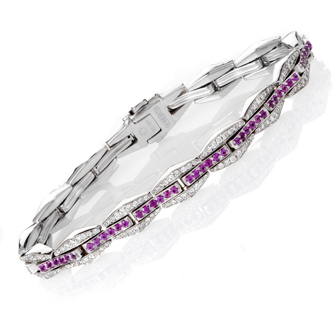 Chimento 18K White Gold Diamond & Pink Sapphire: Concise rivulets of gold and precious stones are given luxurious direction within the perfect parameters of this Chimento bracelet design. 18K White Gold steers the rivers of 2.24ct diamonds and 2.50c