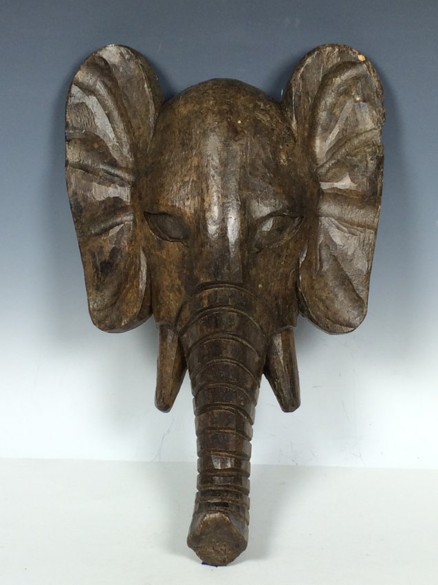 Elephant Head: Philippines Carved Solid Wood Papermache Mold - Elephant 13.5'' H x 8.75'' long A very impressive hand carved decorative wooden Paper Mache mold. That is made by master craftsmen in the Philippines. A