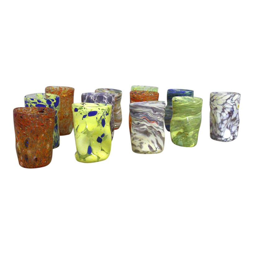 12 assorted, beautifully colored, totally handmade in: 12 assorted, beautifully colored, totally handmade in Murano by a glass master glasses- Goti. These glasses were made in Venice all the way back to the 1600's. Measurement Height: 4.5" / 11.43cm Diame