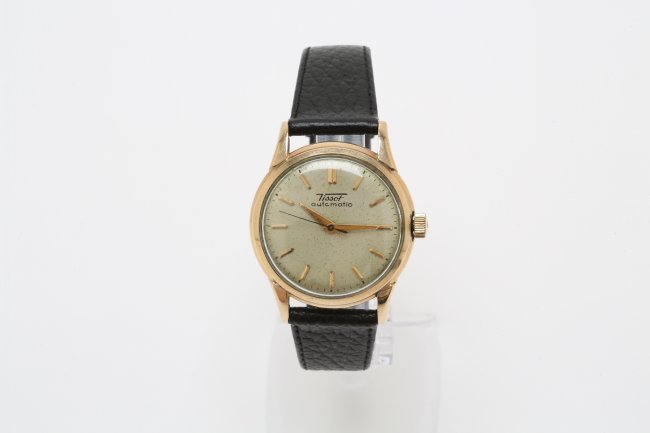 1950s Stainless Steel and Gold Tissot: Established in 1853, Swiss watchmaking company Tissot has a long history of crafting luxury watches that appropriately fit into realms of both sport and dress. It is said that "When you own a Tissot w
