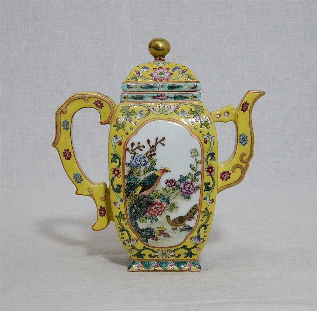 Chinese Famille Rose Porcelain Teapot With Mark: Chinese famille rose porcelain teapot, decorated with open window of birds and flowers. Six red Chinese character mark on the base. Good condition. 6.75" wide x 6.75" height. Buyer Pays Shipping Ships