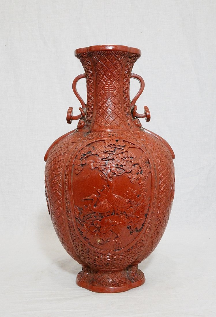 Chinese Monochrome Red Glaze Porcelain Vase With Mark: Chinese monochrome red glaze porcelain vase, decorated with open window of birds and flowers. Six relief of Chinese character mark on the vase. Good condition. 15" height. Buyer Pays Shipping Ships Fr