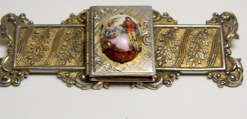 Victorian Era French Locket Brooch Period Victorian: Victorian Era French Locket Brooch Period Victorian Renaissance brooch with excellent detail. A porcelain cabochon with artwork. Free shipping within the USA, 1.5% insurance surcharge (based on the fi
