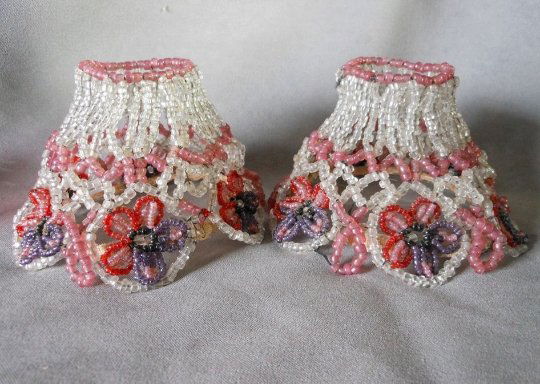 PR Antique Glass Flower, Beaded Lamp Shades: A pair of antique Victorian Glass Lamp Shades. The shades have wire frames and are covered with tiny glass beads in a pretty floral motif. Each shade measures 4 1/4" in diameter at the bottom x 2 3/4: