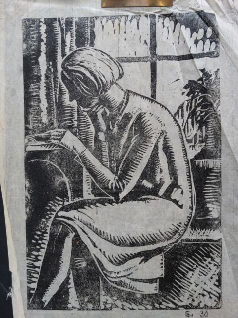 Ejnar Hansen: Woman Reading P1026: Ejnar Hansen woodblock print of a sitting woman, reading at the window. Dated 1930. 8” x 12”. Framed.Many of the woodblocks were done only in the 1929-1931 period and are very rare to find. Proven