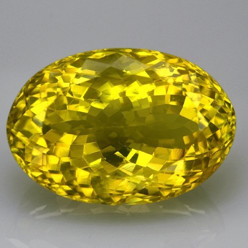 Natural Lemon Citrine Gemstone 43.25 Carats - VVS: Origin -Brazil;Weight- 43.25 ct;Treatment-Temperature Heated;Gem Type-100% Natural Lemon Citrine;Hardness7;Shape As Picture;Refractive Index1.54-1.55; Size 26x21x12.5mm; Specific Gravity2.6;ColorLemon