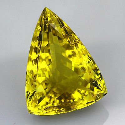 Natural Lemon Citrine Gemstone 35.05 Carats - VVS: Origin -Brazil;Weight- 35.05 ct;Treatment-Temperature Heated;Gem Type-100% Natural Lemon Citrine;Hardness7;Shape As Picture;Refractive Index1.54-1.55; Size26x19.5x 13mm;Specific Gravity2.6;ColorLemonP