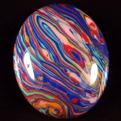 Natural Rainbow Calsilica Cab Gem 14.70 carats: Natural Rainbow Calsilica Cab Gem 14.70 carats...Size23x18.5x5.5mm This item ships from Canada