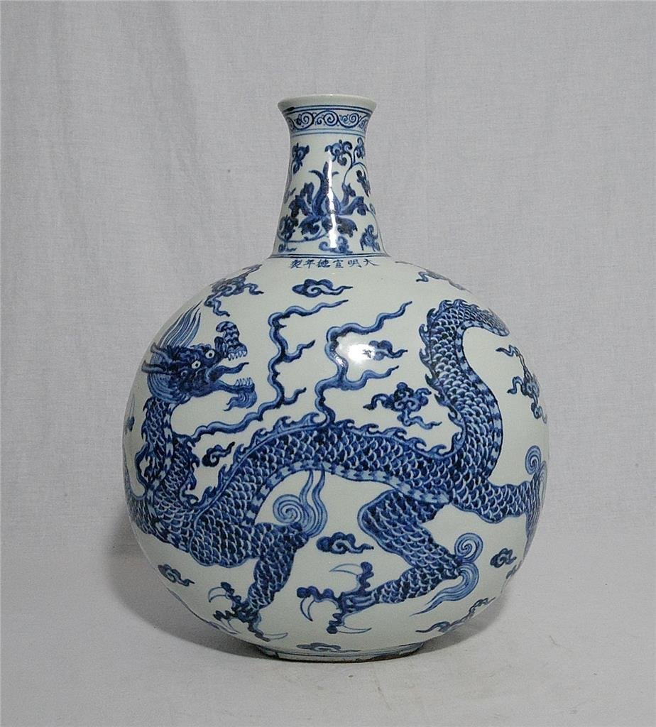 Chinese Blue and White Porcelain Vase With Mark: Chinese blue and white porcelain vase, decorated with dragons . Six blue Chinese character under glaze mark on the top.Good condition. 17.5" height. Buyer Pays Shipping Ships From California LA Ref: N