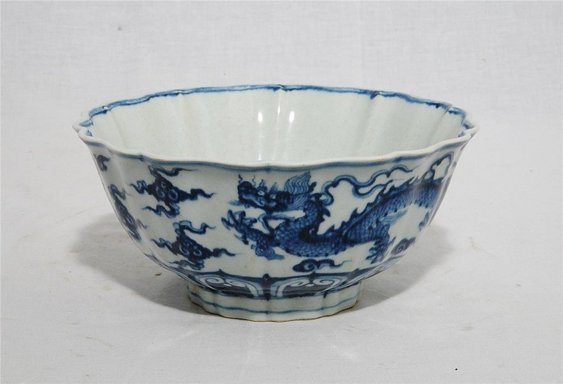 Chinese Blue and White Porcelain Bowl With Mark: Chinese blue and white porcelain bowl, decorated with dragons and fruits. Six blue Chinese character under glaze mark on the base. Good condition. 7.8" diam x 3.5" height. Buyer Pays Shipping Ships Fr