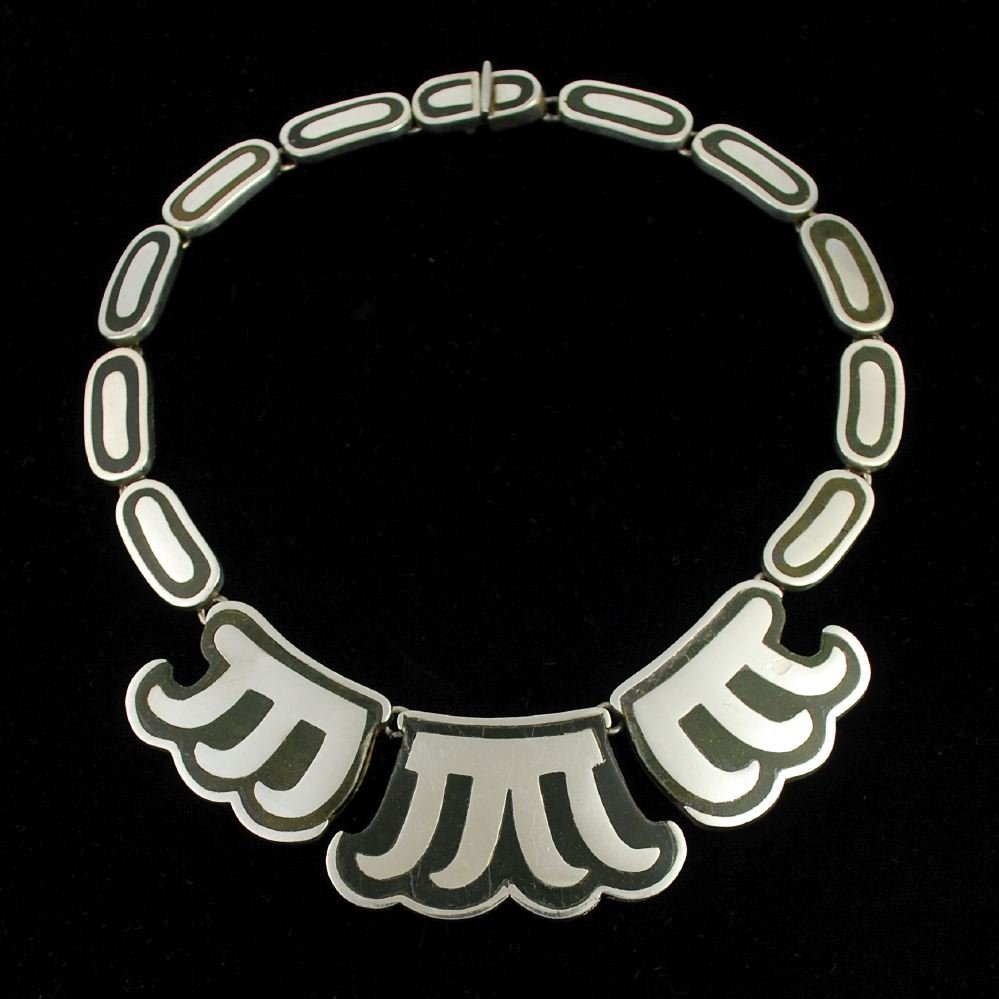 Los Castillo Taxco Sterling Onyx Negro Necklace: Vintage sterling silver necklace by Los Castillo silversmiths of Taxco. From their "Onyx Negro" series made in sterling silver with inlaid black onyx, from the 1950s-1960s. Signed "Los Castillo Taxco,