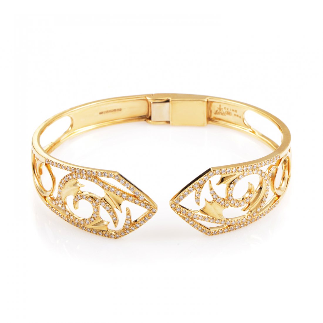 Vortex 18K Yellow Gold Diamond Cuff Bracelet: Expertly crafted from precious 18K yellow gold, this gorgeous Stephen Webster cuff boasts an beguiling and detailed design. The exotic appearance of the cuff's polished finish is further enhanced by t