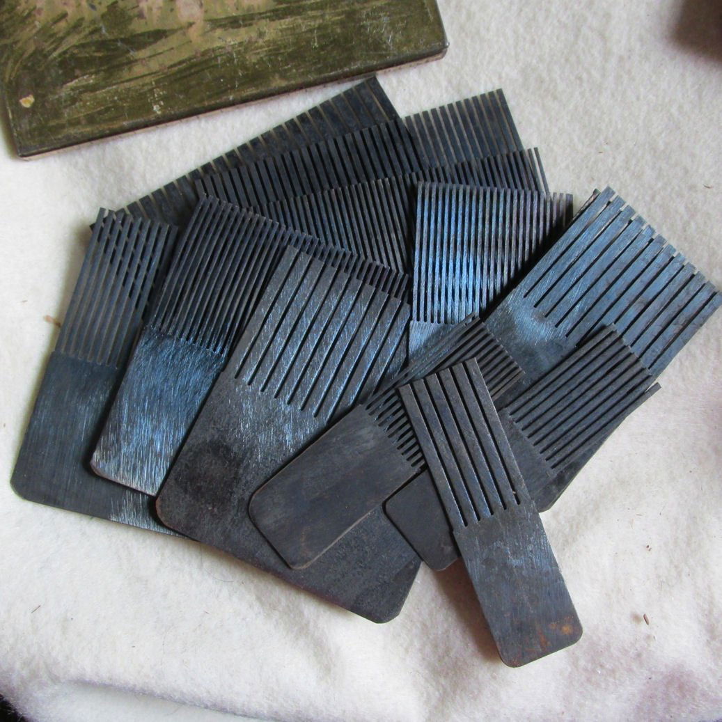 19th Primitive Antique Graining Combs for Paint: A set of antique metal graining combs. The combs were used on wet paint to create special effects on furniture and walls. The set is complete with 12 combs, there are 3 different widths on the combs a