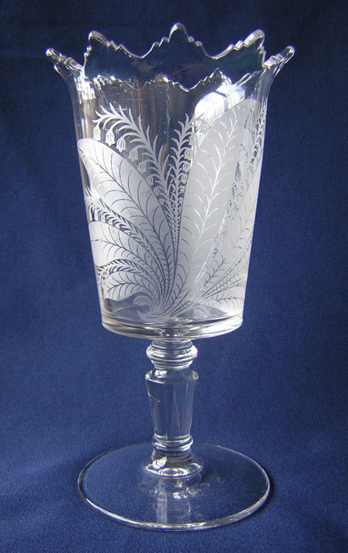 19thC Lily of the Valley Patterned Glass Celery Spooner: A antique (circa late 1800's) Victorian celery or spooner. The Spooner has a delicate acid etched design on the front of Lily of the Valley flowers. The top edge is scalloped and slightly flared. Over