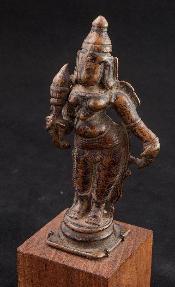 Bronze Standing Laxmi: Lakshmi is the Hindu goddess of wealth, prosperity (both material and spiritual), light, wisdom, fortune, fertility, generosity and courage; and the embodiment of beauty, grace and charm. Representati