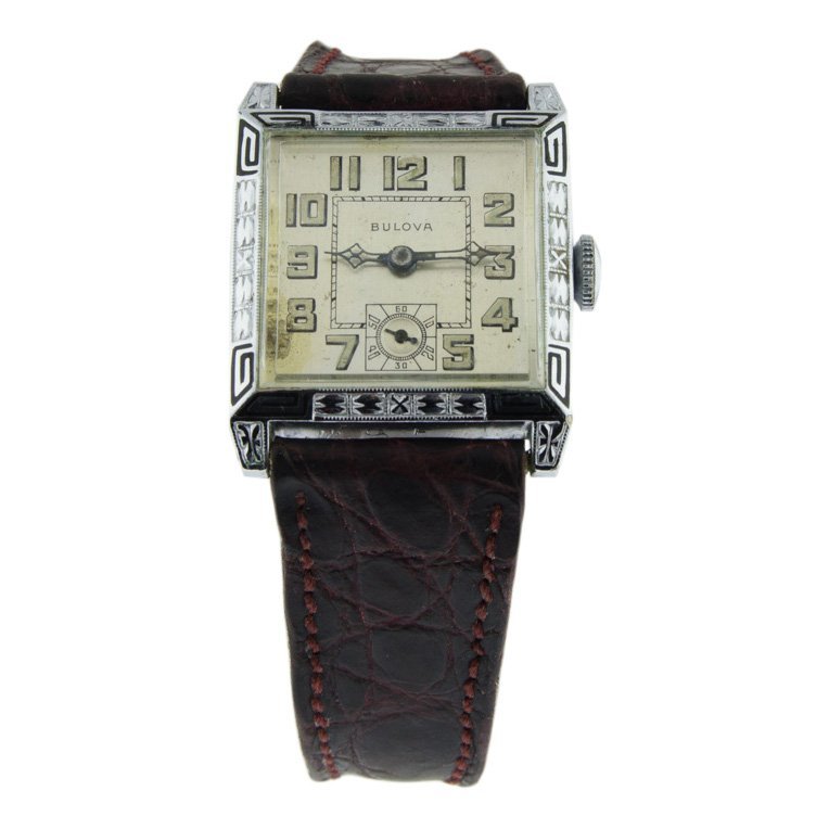Bulova: Circa 1930's. White Metal Case, black enamel. Radiant number art deco hands. Manual wind watch.