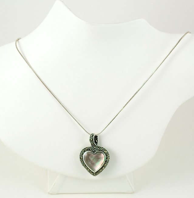 NECKLACE HEART PENDANT MOTHER OF PEARL w MARCASITE: This Brand New STERLING SILVER Necklace features a beautiful 2-sided Sterling Silver Heart Pendant that measures 1 inch across. One side of the Heart features a Mother of Pearl, and the other side is 
