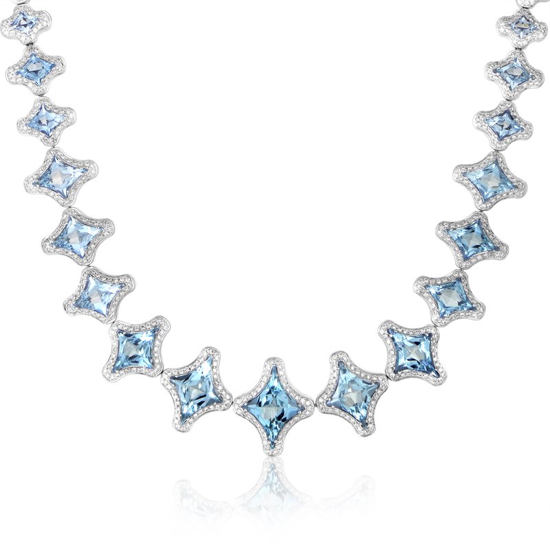 Chimento: Marilyn 18K White Gold Aquamarine & Diamond: Flamboyant and vivacious, this attractive Chimento necklace is comprised of numerous 18K white gold segments, each set with a gorgeous aquamarine stone framed with diamonds. The total weight of aquama