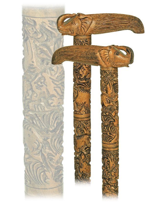 Sandal Wood Cane-20th Century-All sandal wood cane: Sandal Wood Cane-20th Century-All sandal wood cane with an angular elephant head handle and a segmented shaft intricate carved with various animals. Burmese light weighted and very decorative traditio