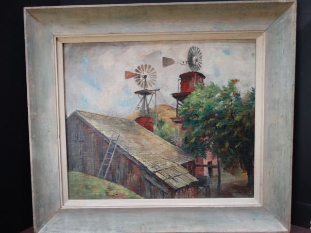 Ejnar Hansen “Barn & Windmills”: One of the best “barn” scenes we’ve seen from the Ejnar Hansen inventory. Here with windmills and ladder, suggesting a farm hard at work. Oil on board, 33w x 29h framed. Image 24w x 21.5h. This