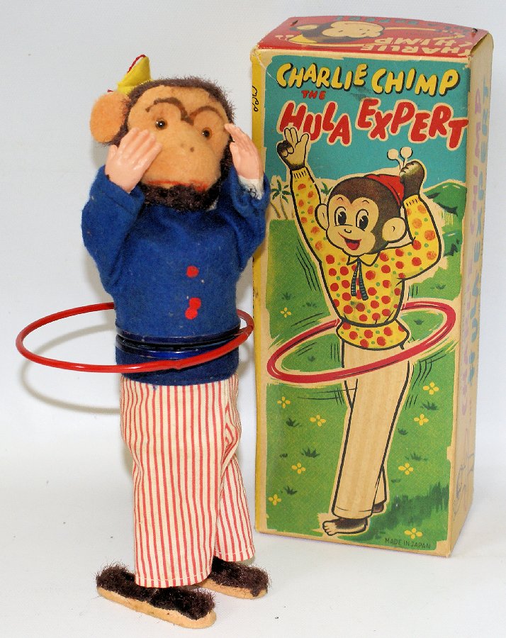 Vintage Wind-up CHARLIE CHIMP the HULA EXPERT Monkey: Vintage Mechanical Wind-up CHARLIE CHIMP the HULA EXPERT Monkey Figure, made by GBC, Japan. Comes in the original box and is in perfect working condition. Measures 8-1/2" tall and is in overall LN con