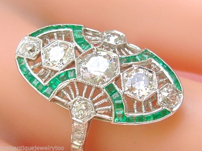 ESTATE ART DECO 1.85ctw DIAMOND .50ctw EMERALD WHITE: This is an ESTATE FILIGREE COCKTAIL RING that was made from 18K WHITE GOLD in the ART DECO style. The age is unknown. The ring is centrally set with 1 ANTIQUE TRANSITIONAL CUT DIAMOND of J color, I cl