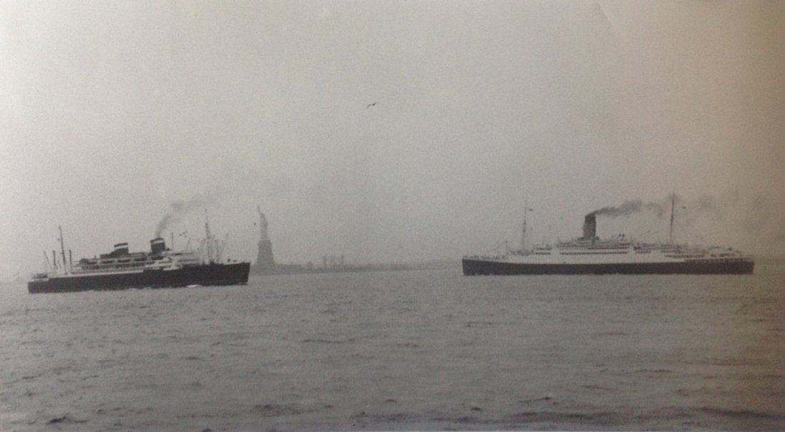 Marguerite Baker Johnson - Mid Century Photograph -: Photographer: Marguerite Baker Johnson Black and White Vintage Mid Century Photograph Dimensions: 9.25 x 5.25 RARE SIZE for Johnson Scene: Two ships cruising with the statue of liberty in the backgrou