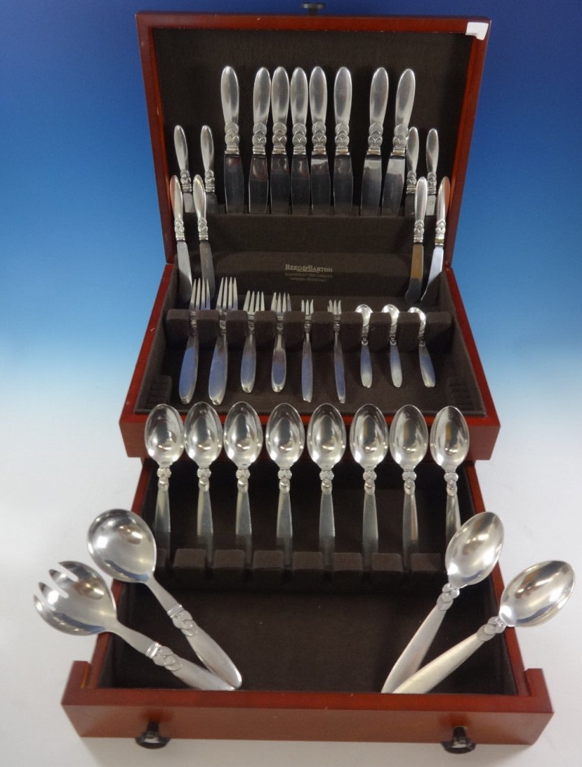 Georg Jensen Cactus Sterling 60pc flatware set: 8 dinner knives 9", 8 dinner forks 7 3/4", 8 salad forks 6 1/4", 8 dessert spoons 6 3/4", 8 butter spreaders 6 1/2", 8 coffee spoons 4 7/8", 8 cocktail forks 6 1/4", 2 serving spoons 7 7/8", 2pc salad