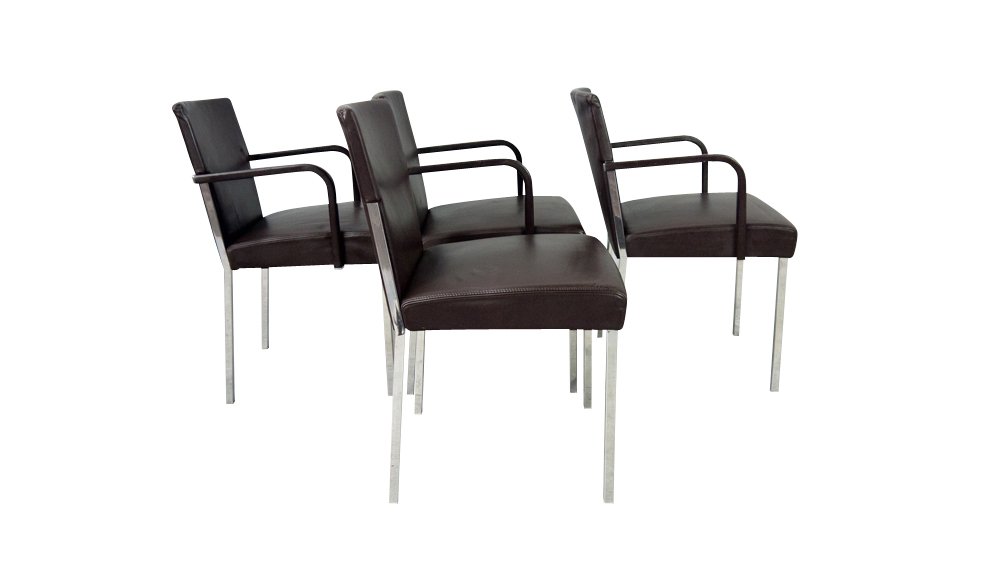 Enrico Franzolini Leather Chromed Steel Chairs: A very highly prized set of chairs designed by Enrico Franzolini for Moroso Furniture. With steel frames with highly polished chrome and wrapped in luxurious leather. The leather appears black under m
