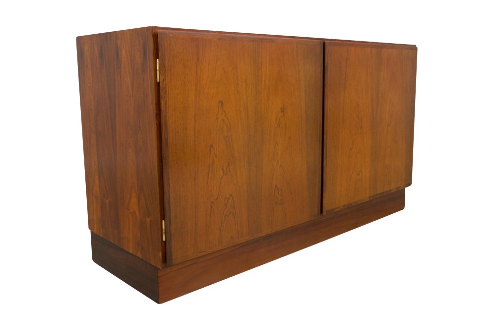 Omann Jun Rosewood Credenza Server Mid Century Danish: This is model #4 designed by Gunni Oman for Omann Jun Mobelfabrik. It measures 47" wide by 27" tall by 17" deep. The rosewood grain is spectacular and is highlighted by a finish that has been restored