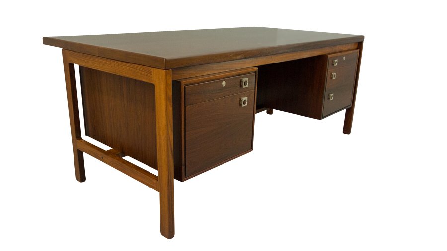 Rosewood Desk Arne Vodder Danish Modern Mid Century: A spectacular rosewood desk designed by Arne Vodder. It measures 69" wide by 37.5" deep by 28.5" tall. The condition of the finish is restored condition. There is some minor discoloration that did not