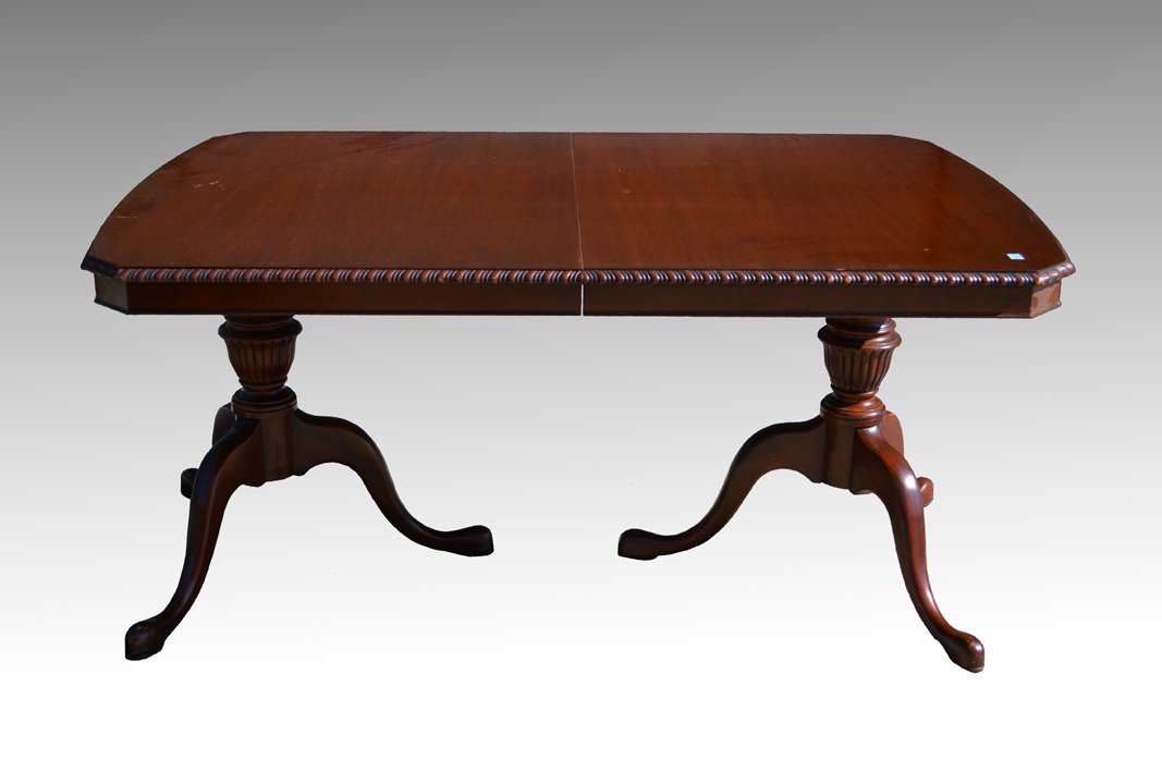 Mahogany Chippendale Dining Room Table by Drexel: We are pleased to be offering today this beautiful double pedestal Chippendale queen Anne pad foot with a rope braided edge dining table. This table dates from the 1940s and was made by the Drexel Fur