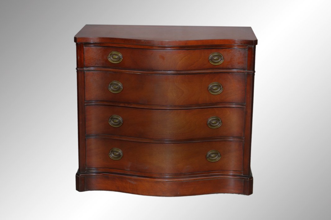 Vintage Mahogany Drexel Beautiful Server: We are pleased to be offering today this wonderful condition mahogany four drawer serpentine front Duncan Phyfe formal style server or silverware chest that dates from the 1940s. This was made and sol