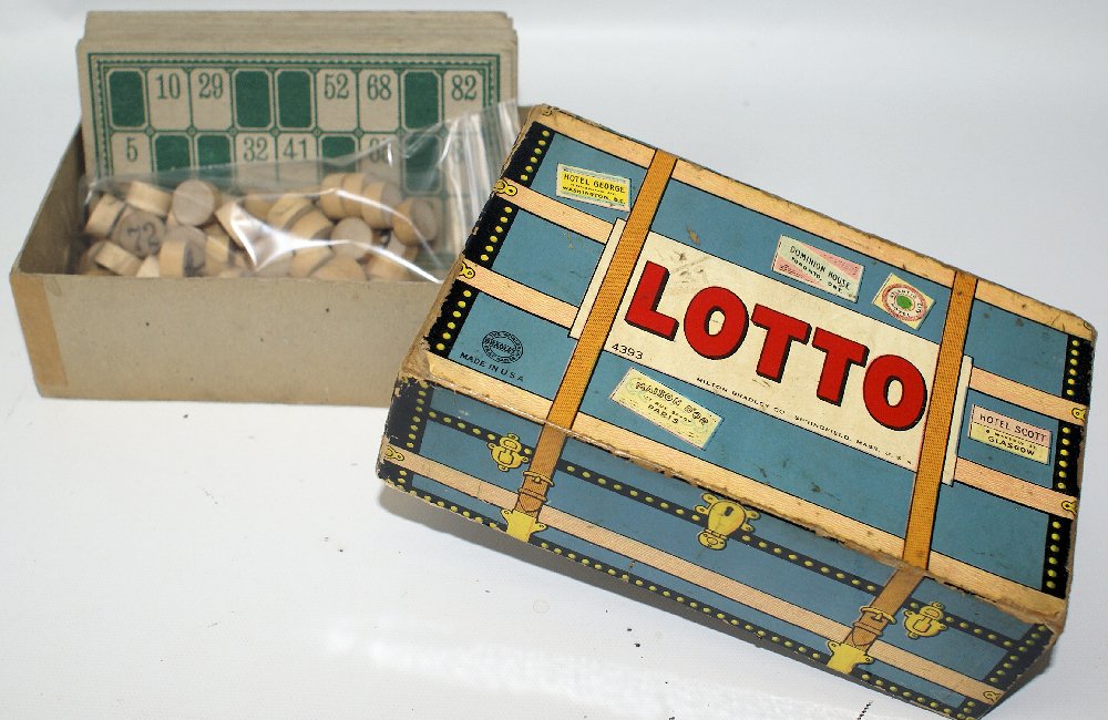 Vintage GAME OF LOTTO #4393 by Milton Bradley in: Vintage GAME OF LOTTO #4393 by Milton Bradley. Contains 24 cards and bag of wooden number circles. Cover shows the classic steamer trunk box. Some shelfwear on the box. Overall very good condition. Ni