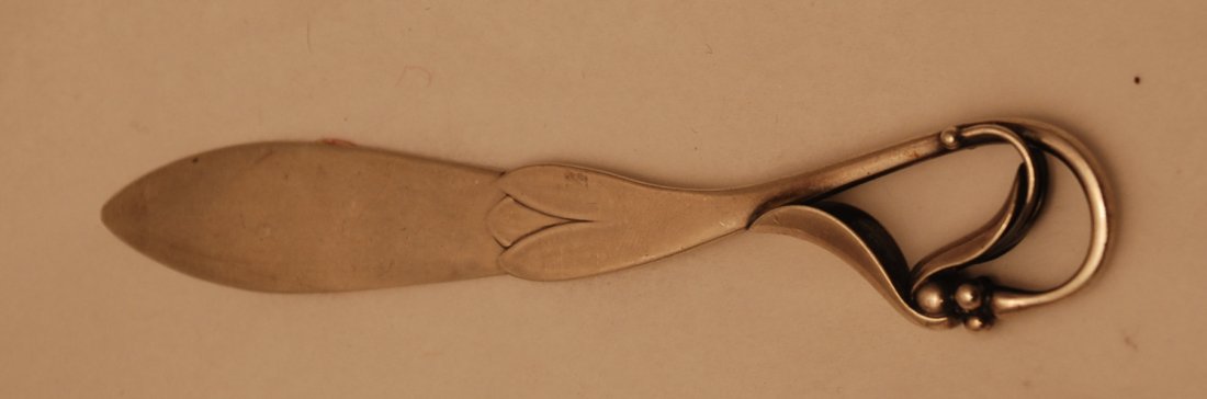 Georg Jensen Sterling Silver Pea in the Pod Letter: Georg Jensen Sterling Silver Pea in the Pod Letter Knife Measurement: 5 and 1/2 inches in length Bearing marks as shown. Please note that this lot has a reserve. When you leave a bid in advance of the