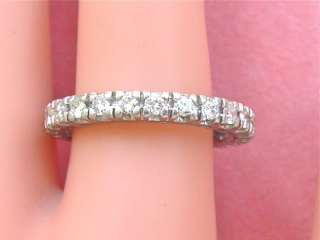 VINTAGE 1.2ctw TRANSITIONAL DIAMOND PLATINUM ETERNITY: This is an ORIGINAL VINTAGE ETERNITY BAND RING that was HANDMADE from PLATINUM during the 1950s. The ring is set with 24 TRANSITIONAL CUT DIAMONDS of H to I color, VS to SI clarity that weigh approx. 