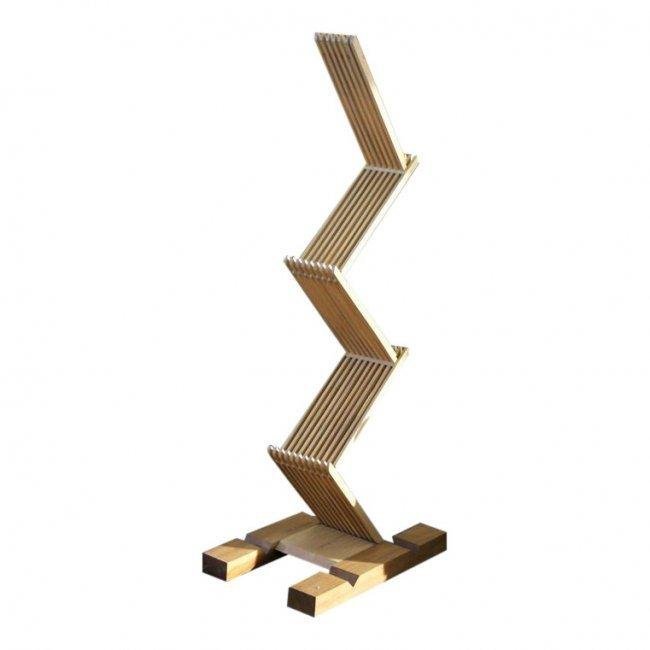 Hosoe Isao Magazine Holder: Published "L'albero Della Gomma" An historic example of design that stands out for its natural style. Desinged by Hosoe Isao Magazine Holder rack All Wood on Wheels it folds to different sizes.This is