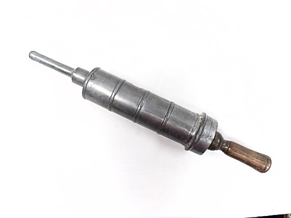 French Antique Pewter and wood Enema Syringe: 1218 gr 48 cm (18 3/4") x 6,5 cm (9") wide. Very good condition. Made in France in the mid 19th century. No Reserve Buyer pays flat-rate shipping of $24 within the continental US. International: Addit