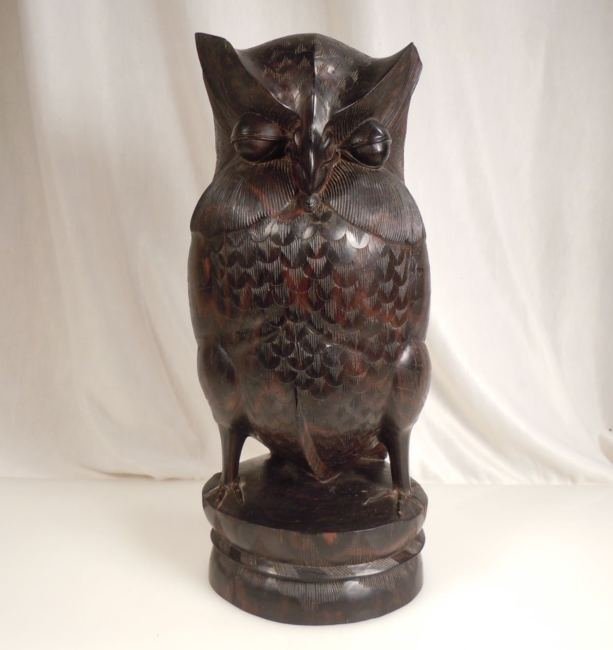 Hand Carved Ebony or Rosewood Wood Owl Sculpture 12": Beautiful detailed carving of an owl standing 12" in height and very heavy, appears to be ebony or rosewood. A few small chips around the eyes, not easily seen. No Reserve Free shipping for this item