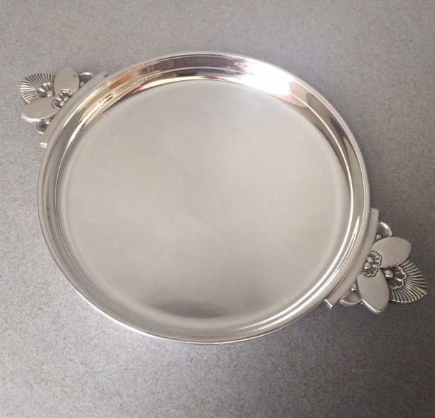 Georg Jensen Sterling Silver Small "Cactus" Tray No.: Georg Jensen Sterling Silver Small "Cactus" Tray No. 629B by Gundorph Albertus Round sterling silver tray with two cactus motifs as handles. Can be used for a wine coaster or condiment set. Very good