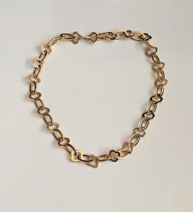 Van Cleef & Arpels: 18K Gold Bracelet: Very rare Van Cleef & Arpels yellow gold Byzantine Alhambra necklace. It is in impeccable condition. It is very versatile! You can dress it up or wear every day. The necklace is fully marked "VCA" wit
