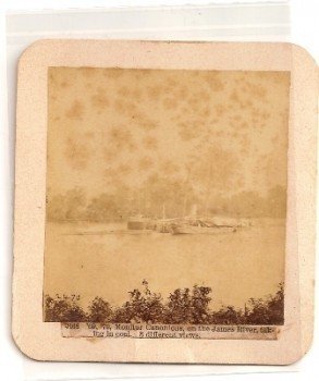 Civil War Albumen Photo of The USS Monitor: This is a authentic antique albumen photo taken on the James River of the Monitor Class iron clad boat called The USS Cannonicus being re-fueled with coal. Taken by John Taylor of Hartford Conn. 2 3/4