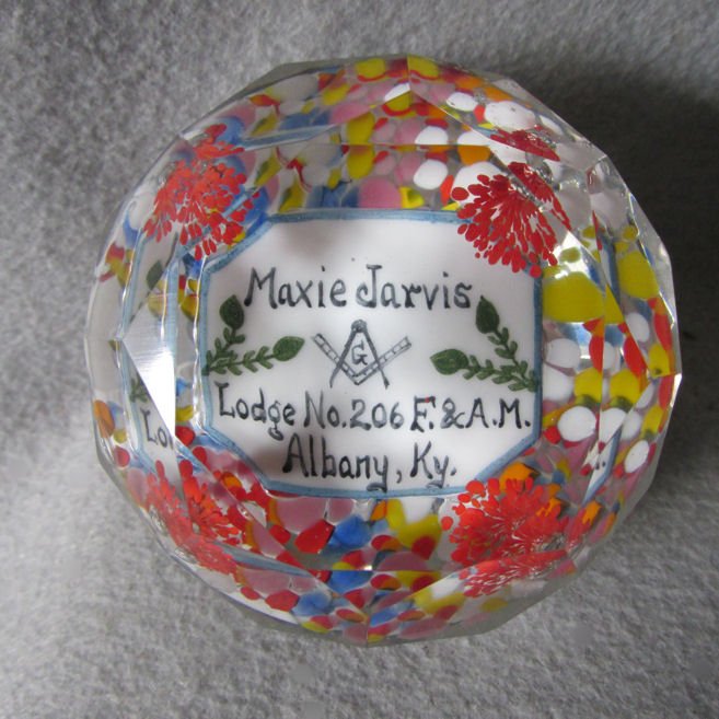 Antique Cut Glass Masonic Paperweight: A fine antique cut glass Paperweight. The Paperweight has a lovely Masonic design and is marked "Maxie Jarvis, Lodge No. 206 F. & A.M., Albany, Ky.". It measures 3" in diameter x 2 1/4" high. Shipping
