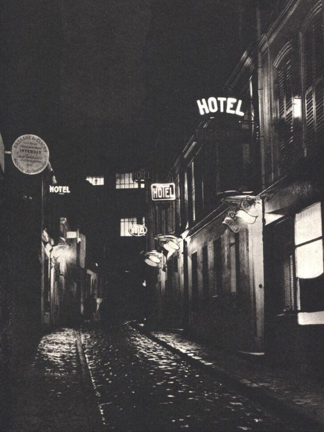Brassai - Passage de Clichy: Sheet-Fed Gravure printed by La Societe D'Impressions Lorraines - Nancy, France in 1987 - Image size approx. 7"x9.5" Shipping Domestic: $15 shipping within the Continental USA. International: Addition
