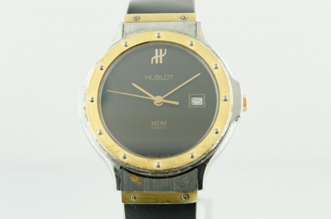 Hublot 18K Gold & Steel Watch: 18K Gold & Steel 33mm battery operated rubber strap great for every day wear Shipping Provider: FedEx and USPS Domestic: Free shipping within the Continental USA! International: Buyer pays for Interna